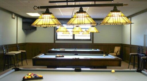 Clubhouse game room with pool tables