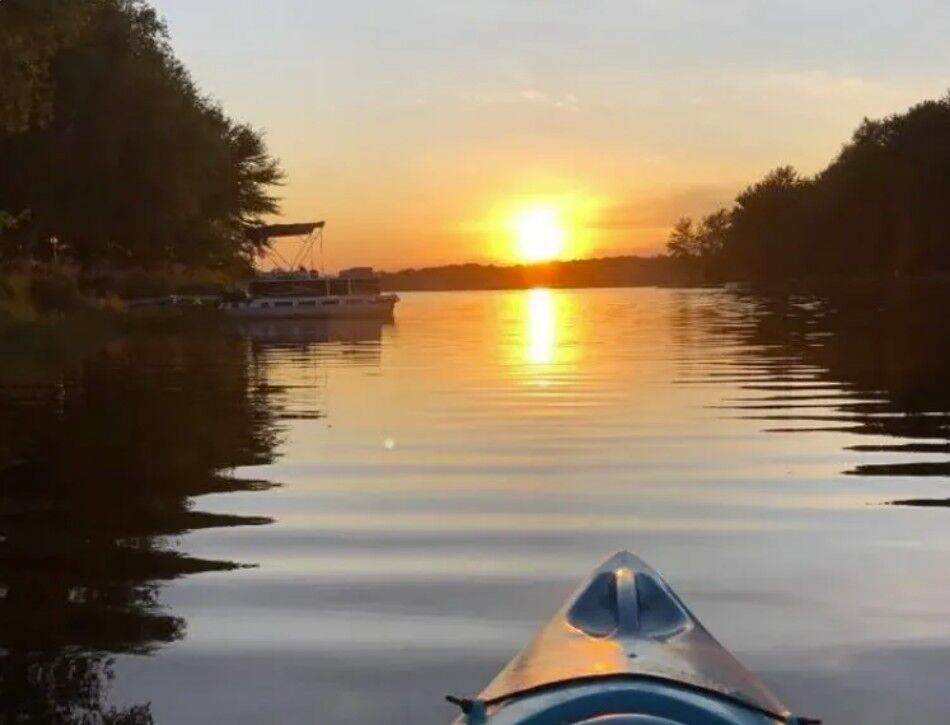 Kayaking at sunset on the lake